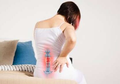 Backache with spine diagram on woman