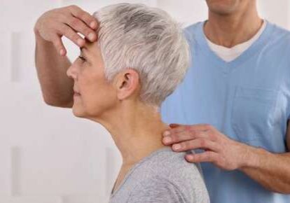 Senior woman receiving neck treatment