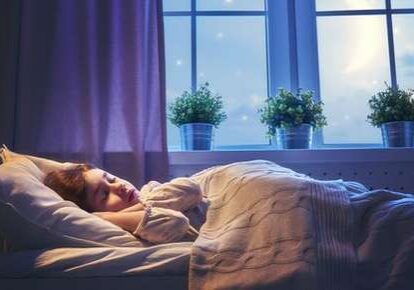 Woman sleeping peacefully by window